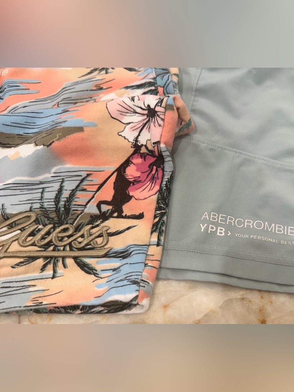 2 PAIRS -1 Price 
Boys Guess and Abercrombie shorts size 11/12